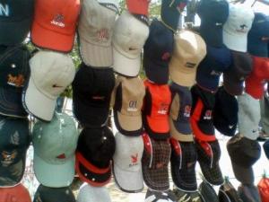 Caps displayed by a seller during the summer